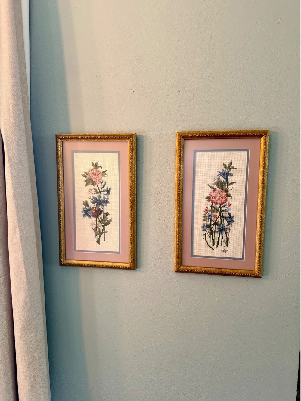 Vintage 1989 Floral Cross Stitch Pair Framed Wall Art Pink Blue Gold Frames